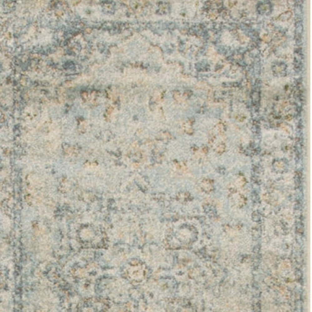10' Blue And Ivory Floral Medallion Distressed Washable Runner Rug
