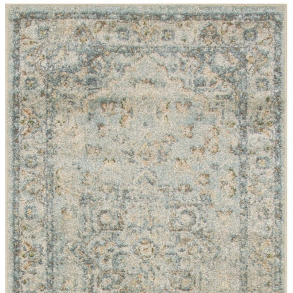 10' Blue And Ivory Floral Medallion Distressed Washable Runner Rug