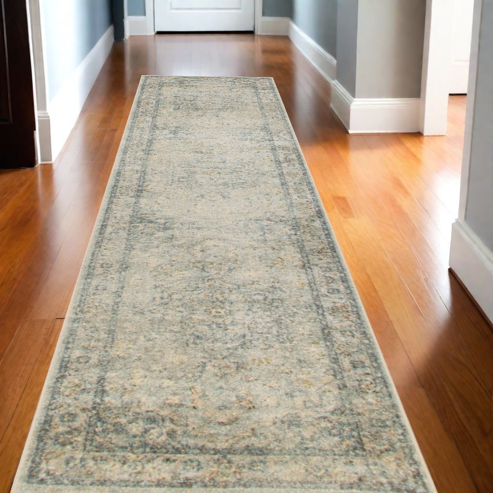 10' Blue And Ivory Floral Medallion Distressed Washable Runner Rug