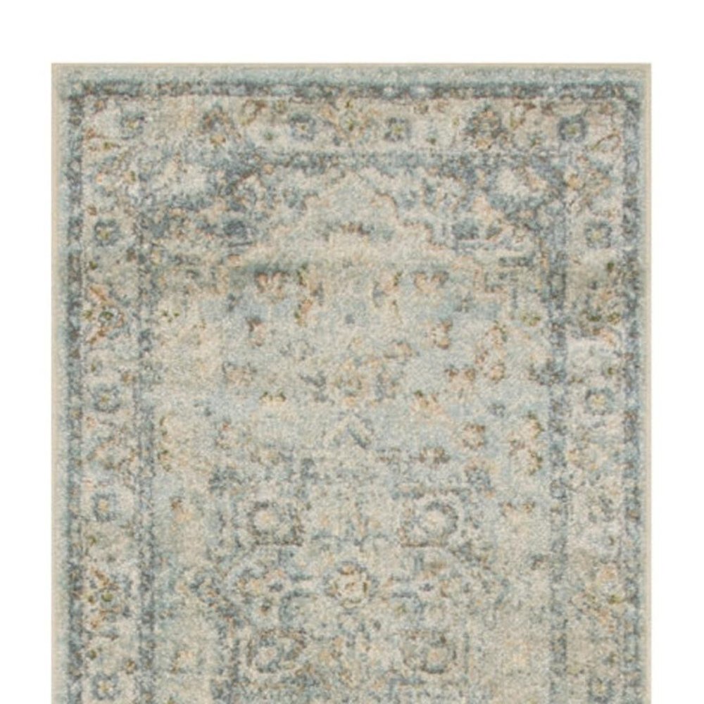 8' Blue And Ivory Floral Medallion Distressed Washable Runner Rug