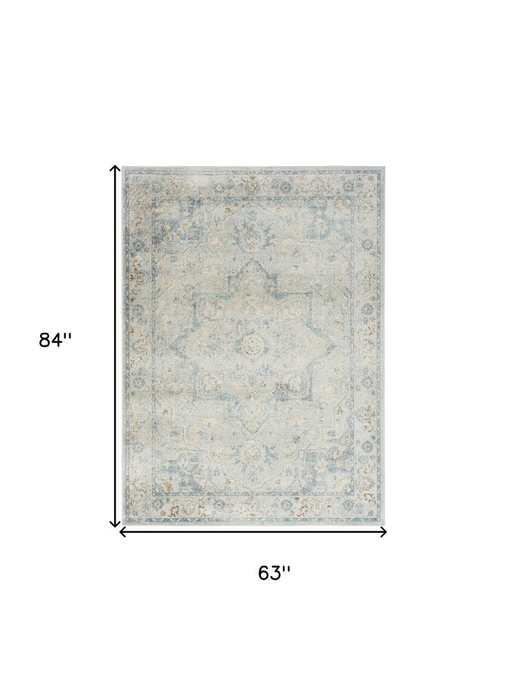 5' X 7' Blue and Ivory Floral Medallion Power Loom Distressed Washable Area Rug