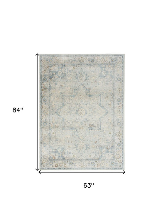 5' X 7' Blue and Ivory Floral Medallion Power Loom Distressed Washable Area Rug