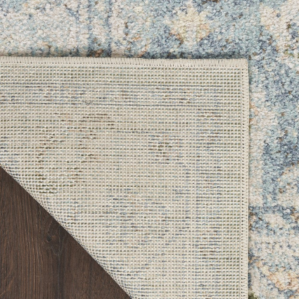 8' X 10' Blue and Ivory Floral Medallion Power Loom Distressed Washable Area Rug