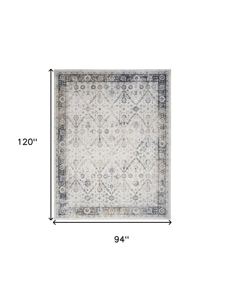 8' X 10' Blue and Ivory Floral Medallion Power Loom Distressed Washable Area Rug
