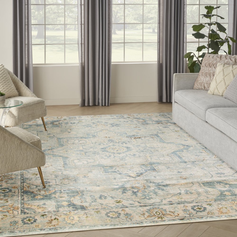 9' X 12' Blue and Ivory Floral Medallion Power Loom Distressed Washable Area Rug