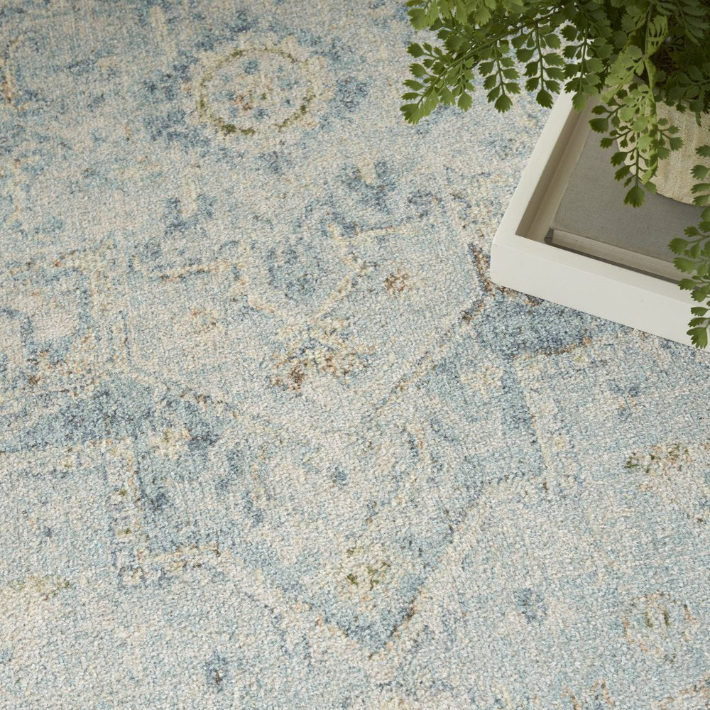 9' X 12' Blue and Ivory Floral Medallion Power Loom Distressed Washable Area Rug