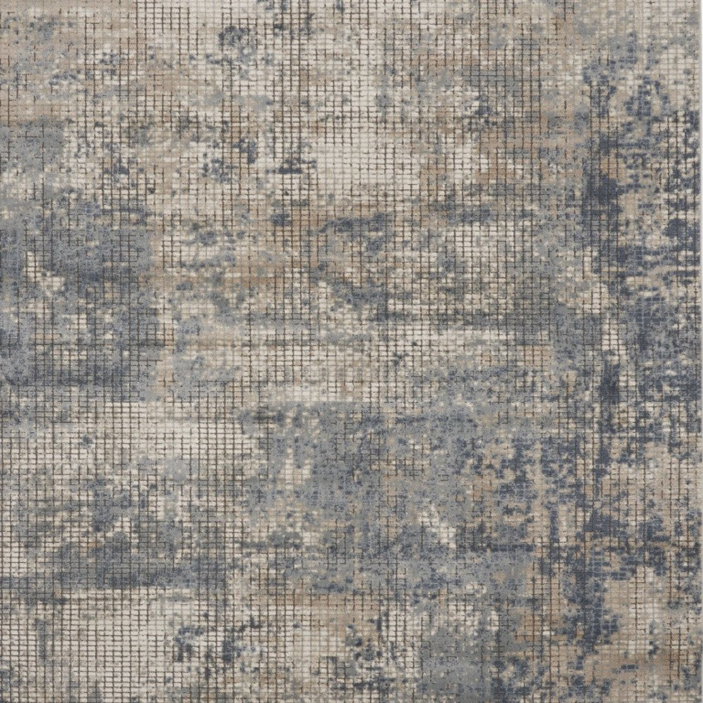 9' X 12' Beige and Blue Abstract Power Loom Distressed Area Rug