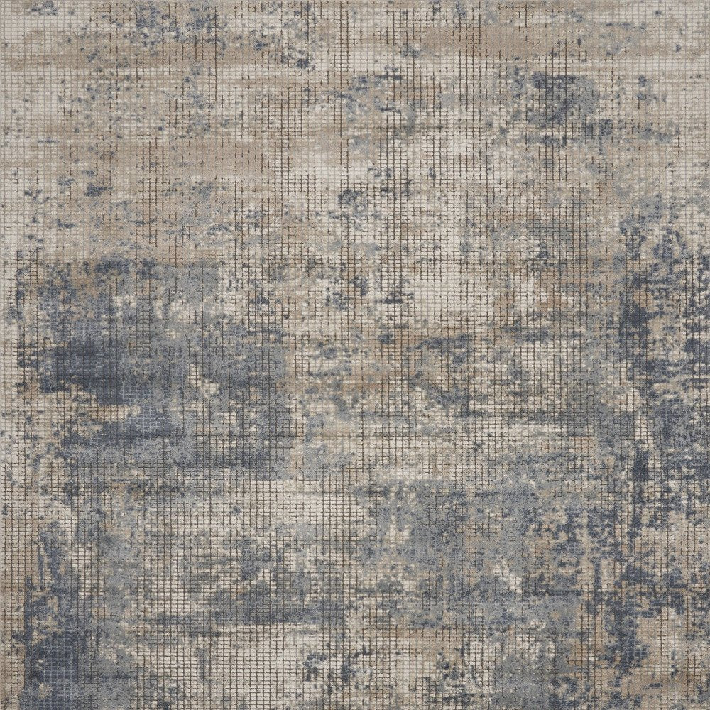 9' X 12' Beige and Blue Abstract Power Loom Distressed Area Rug