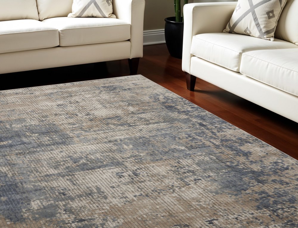 9' X 12' Beige and Blue Abstract Power Loom Distressed Area Rug