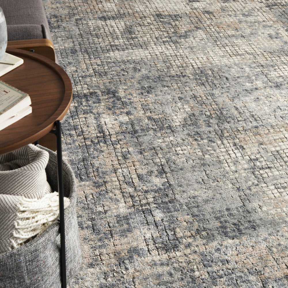 9' X 12' Beige and Blue Abstract Power Loom Distressed Area Rug