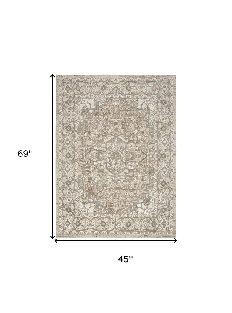 4' X 6' Beige and Ivory Medallion Power Loom Distressed Area Rug