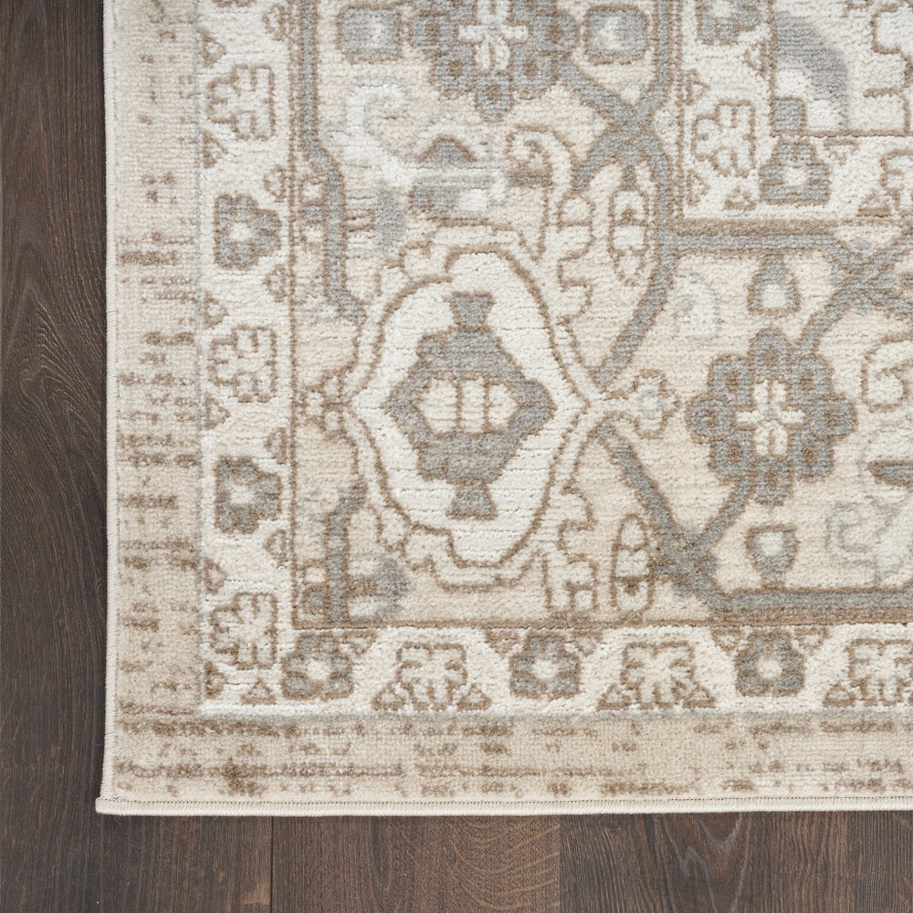 5' X 7' Beige and Ivory Medallion Power Loom Distressed Area Rug