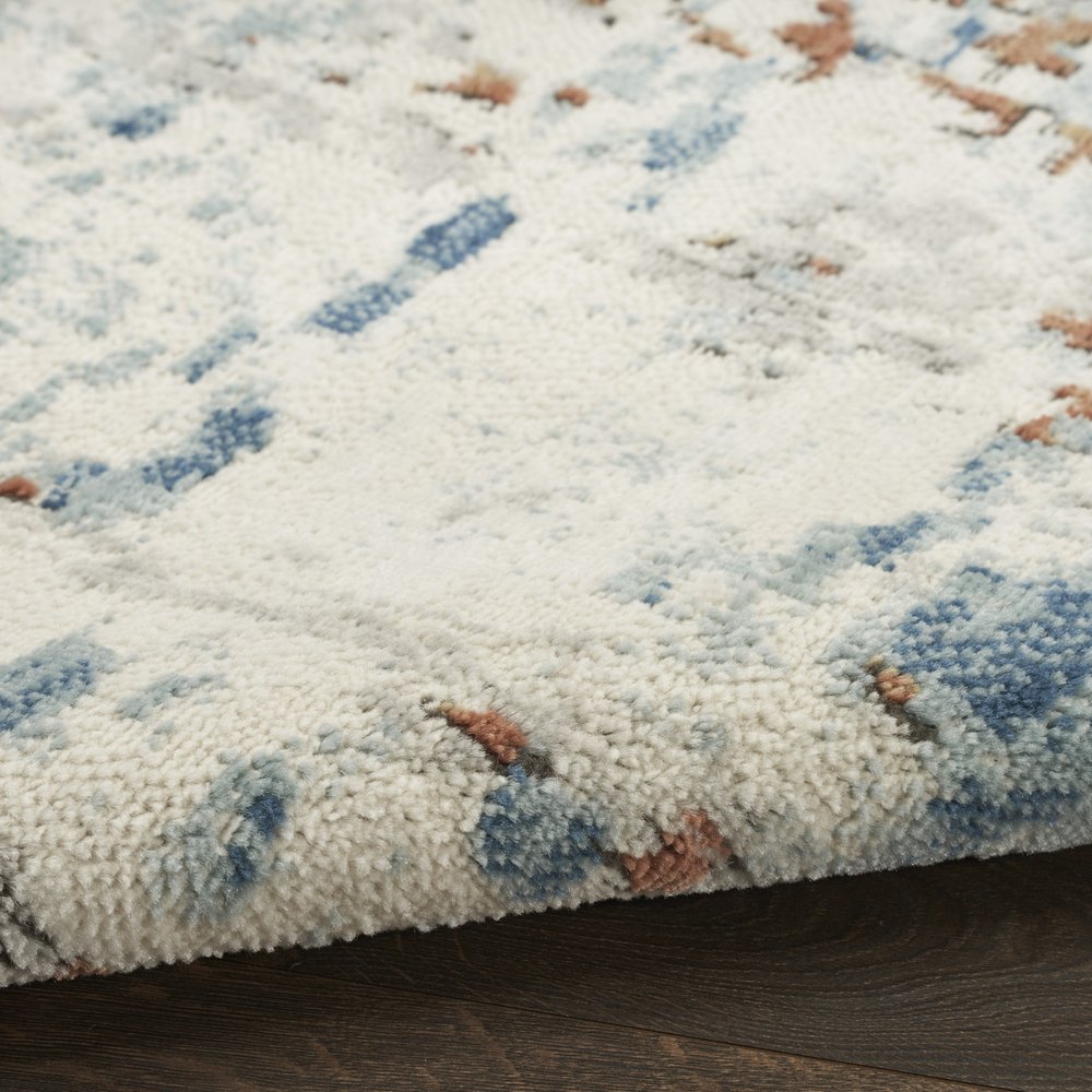 4' X 6' Beige and Blue Abstract Power Loom Area Rug