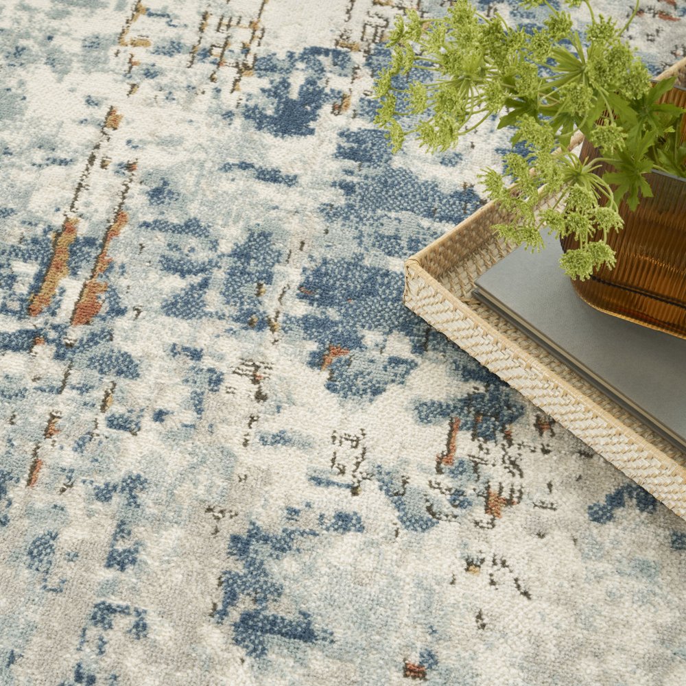 4' X 6' Beige and Blue Abstract Power Loom Area Rug