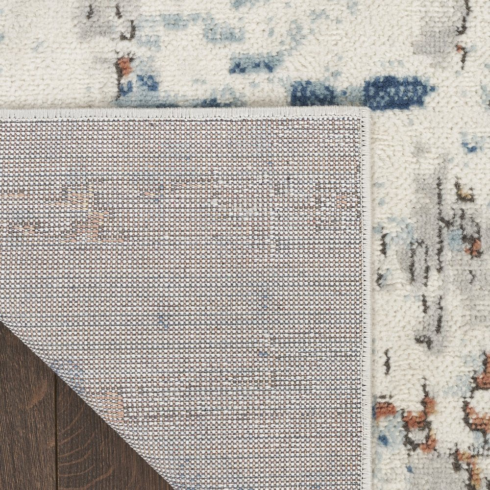 4' X 6' Beige and Blue Abstract Power Loom Area Rug