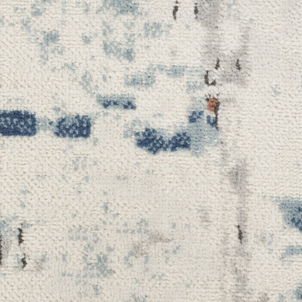 5' X 7' Beige and Blue Abstract Power Loom Area Rug