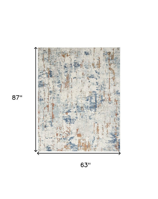 5' X 7' Beige and Blue Abstract Power Loom Area Rug