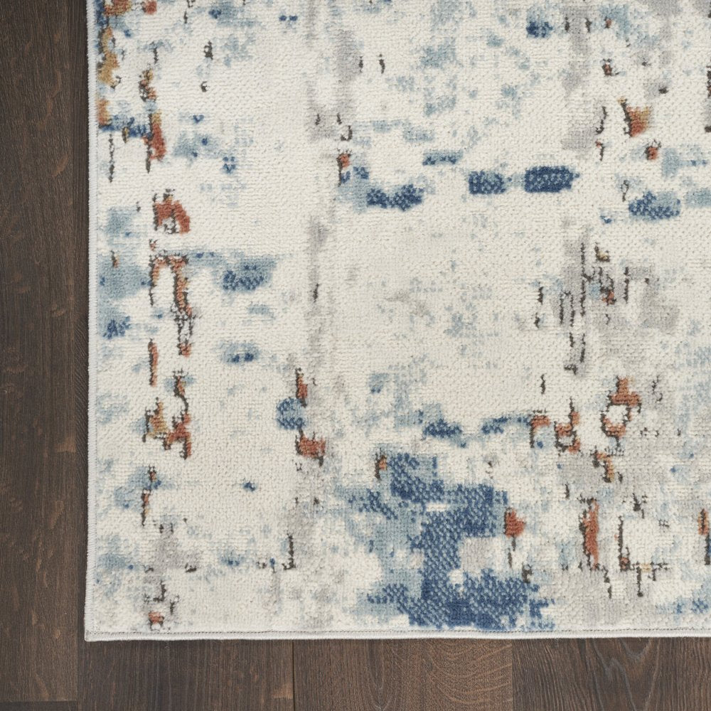 5' X 7' Beige and Blue Abstract Power Loom Area Rug