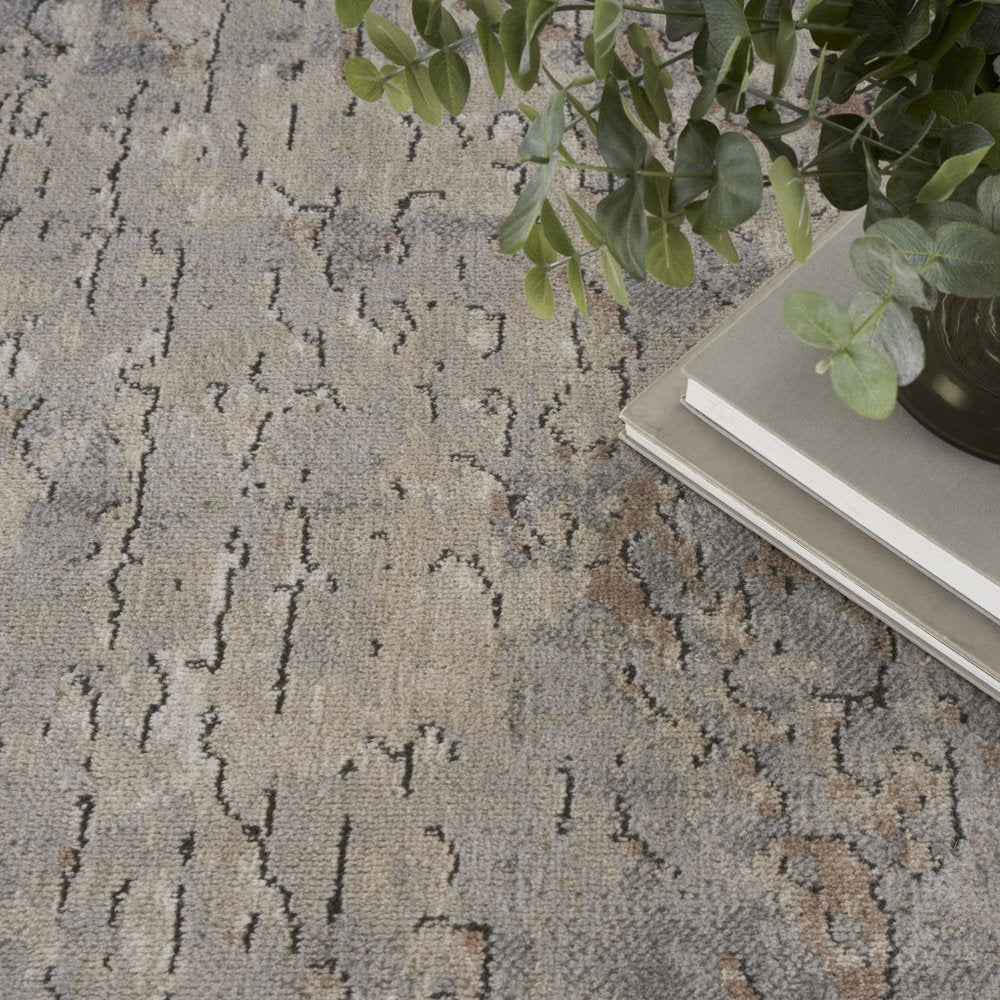 8' Beige and Gray Round Abstract Power Loom Area Rug