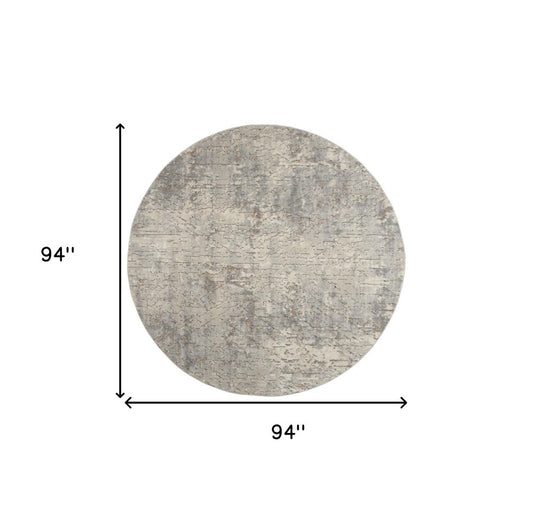 8' Beige and Gray Round Abstract Power Loom Area Rug