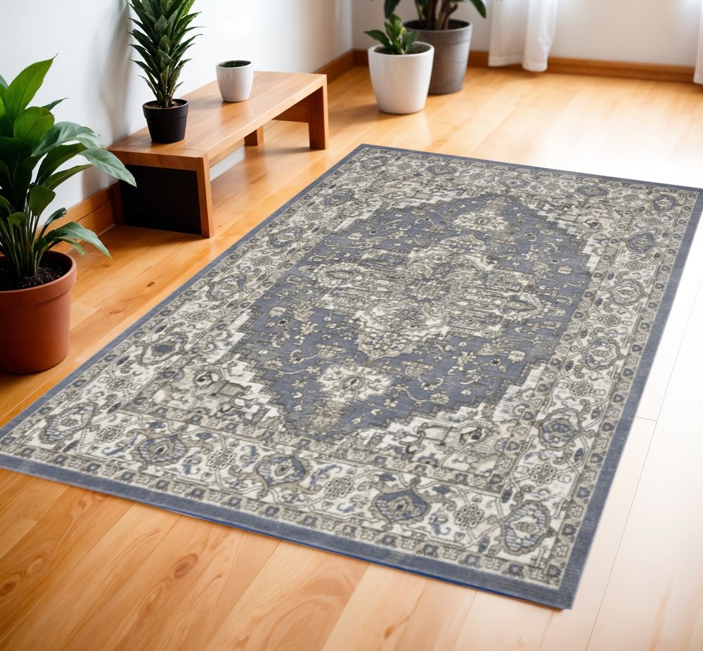 4' X 6' Blue And Ivory Medallion Distressed Area Rug