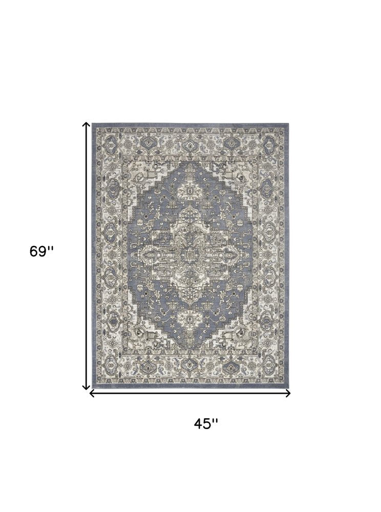 4' X 6' Blue And Ivory Medallion Distressed Area Rug