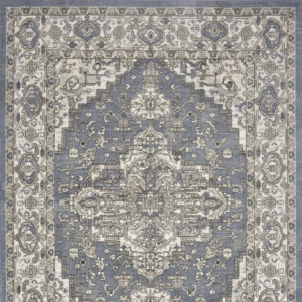 5' X 7' Blue and Ivory Medallion Power Loom Distressed Area Rug