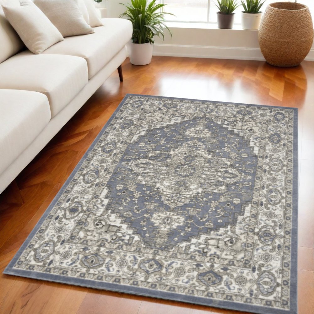 5' X 7' Blue and Ivory Medallion Power Loom Distressed Area Rug