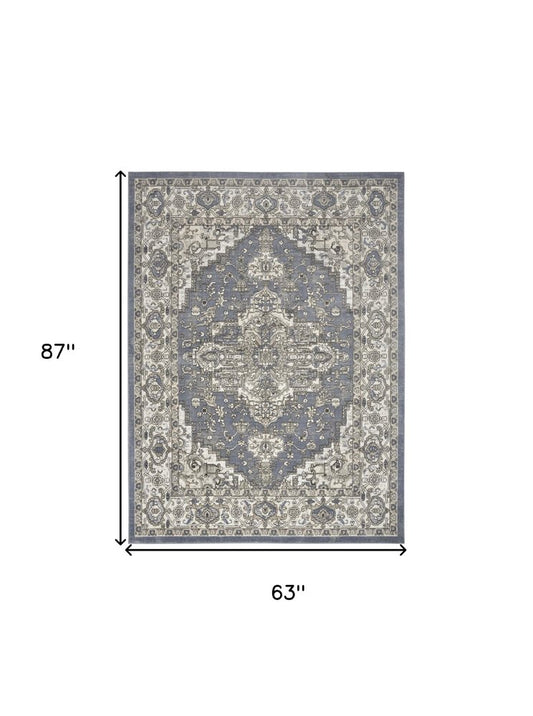5' X 7' Blue and Ivory Medallion Power Loom Distressed Area Rug