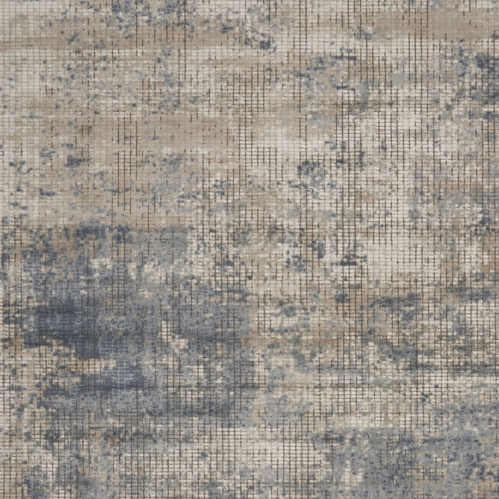 7' X 10' Beige and Blue Abstract Power Loom Distressed Area Rug