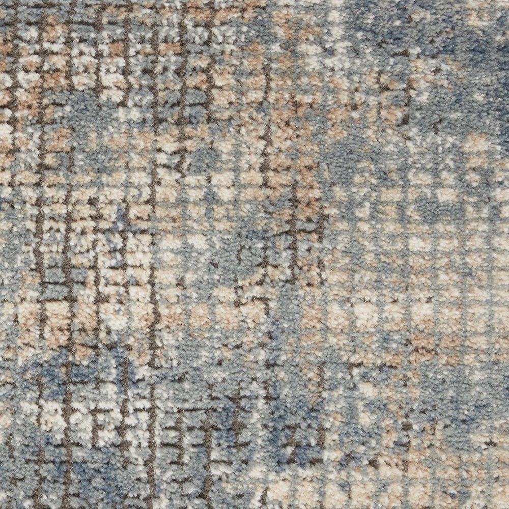 7' X 10' Beige and Blue Abstract Power Loom Distressed Area Rug