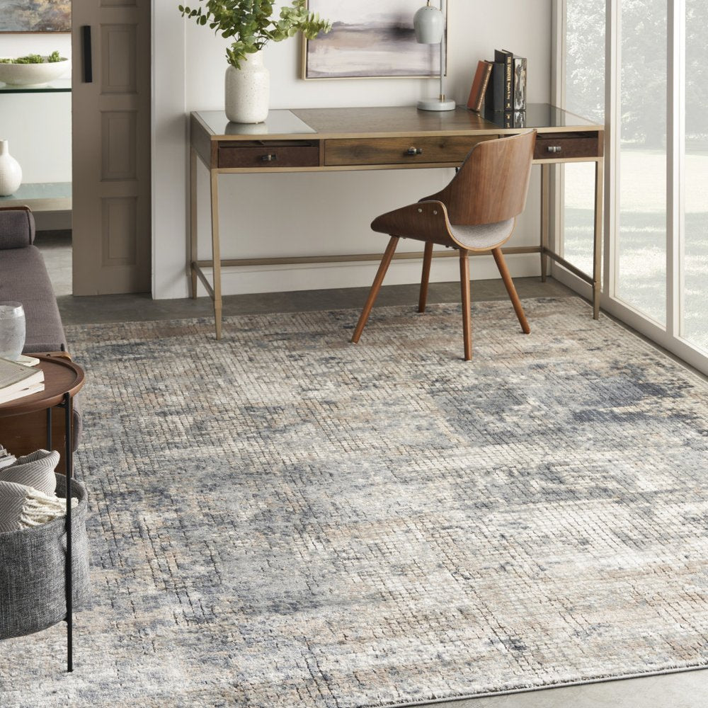 7' X 10' Beige and Blue Abstract Power Loom Distressed Area Rug