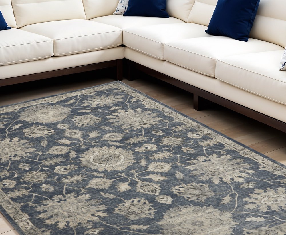 7' X 10' Beige and Blue Floral Medallion Power Loom Area Rug