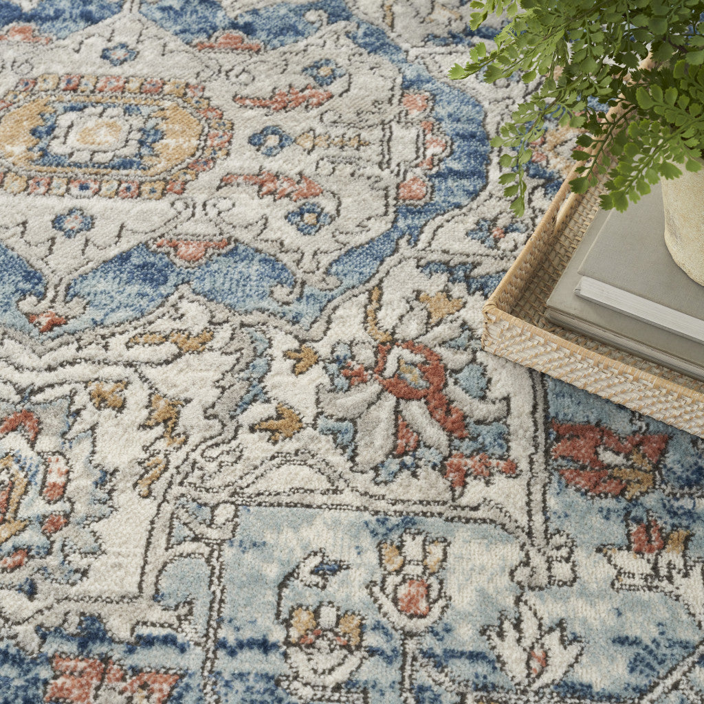 7' X 10' Blue and Ivory Medallion Power Loom Distressed Area Rug