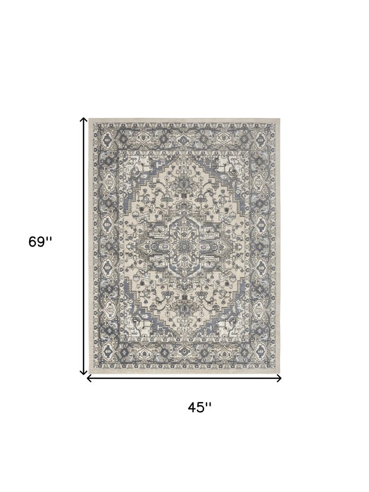 4' X 6' Blue and Ivory Medallion Power Loom Distressed Area Rug