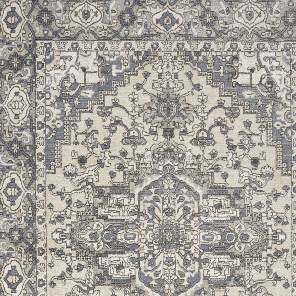 5' X 7' Blue and Ivory Medallion Power Loom Distressed Area Rug