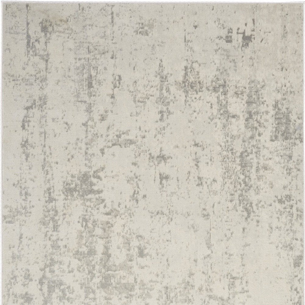4' X 6' Gray and Ivory Abstract Power Loom Area Rug