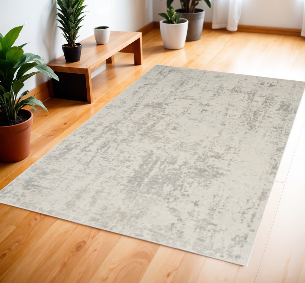 4' X 6' Gray and Ivory Abstract Power Loom Area Rug