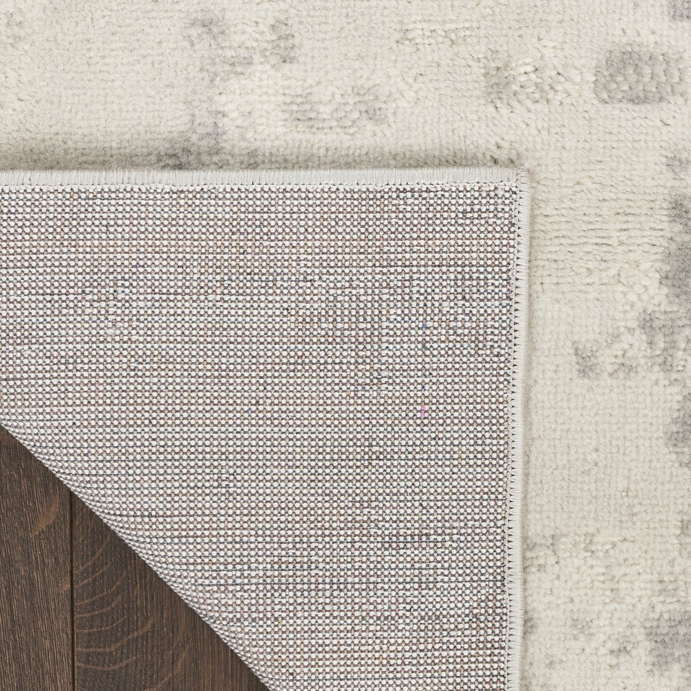 4' X 6' Gray and Ivory Abstract Power Loom Area Rug