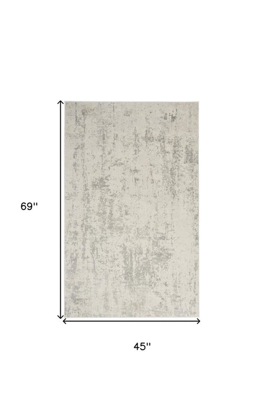 4' X 6' Gray and Ivory Abstract Power Loom Area Rug