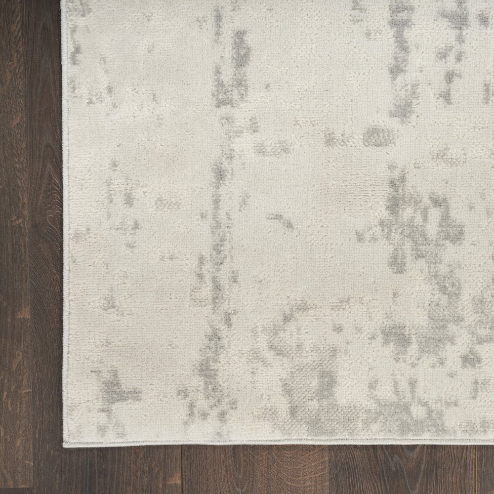 4' X 6' Gray and Ivory Abstract Power Loom Area Rug