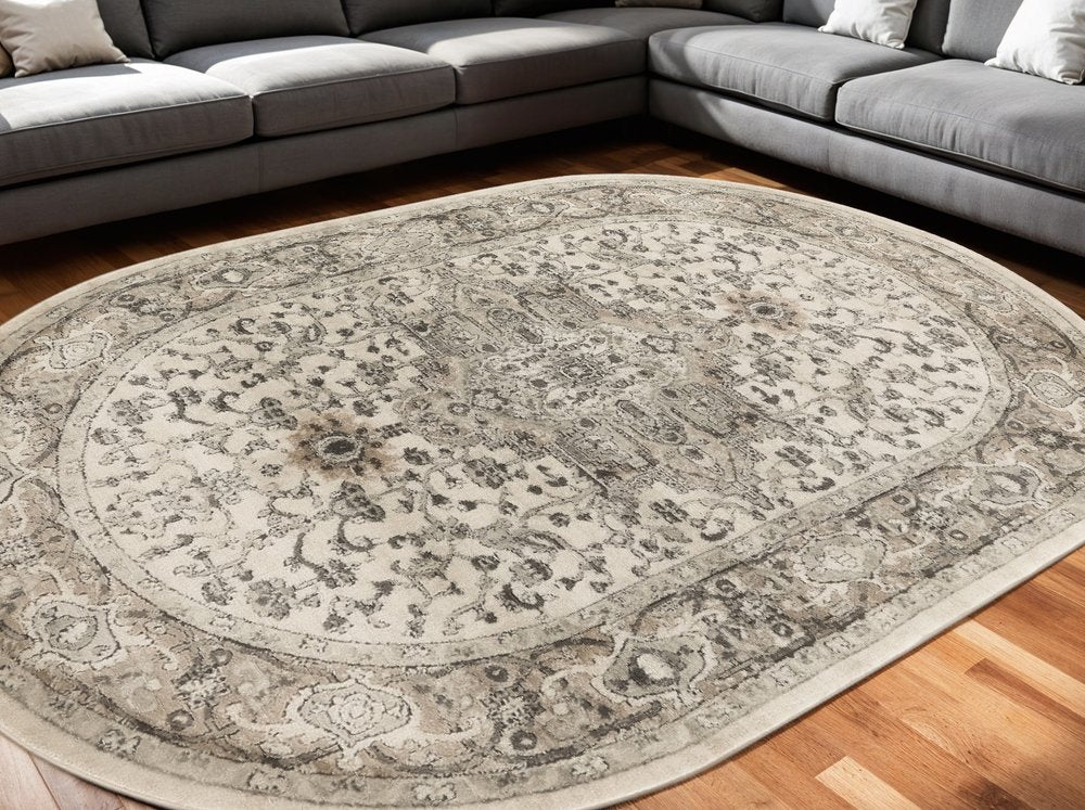 6' X 9' Gray and Ivory Medallion Power Loom Distressed Area Rug