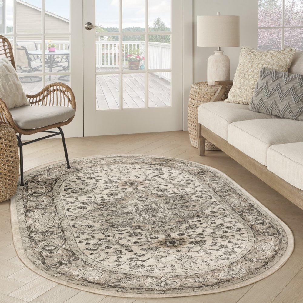 6' X 9' Gray and Ivory Medallion Power Loom Distressed Area Rug