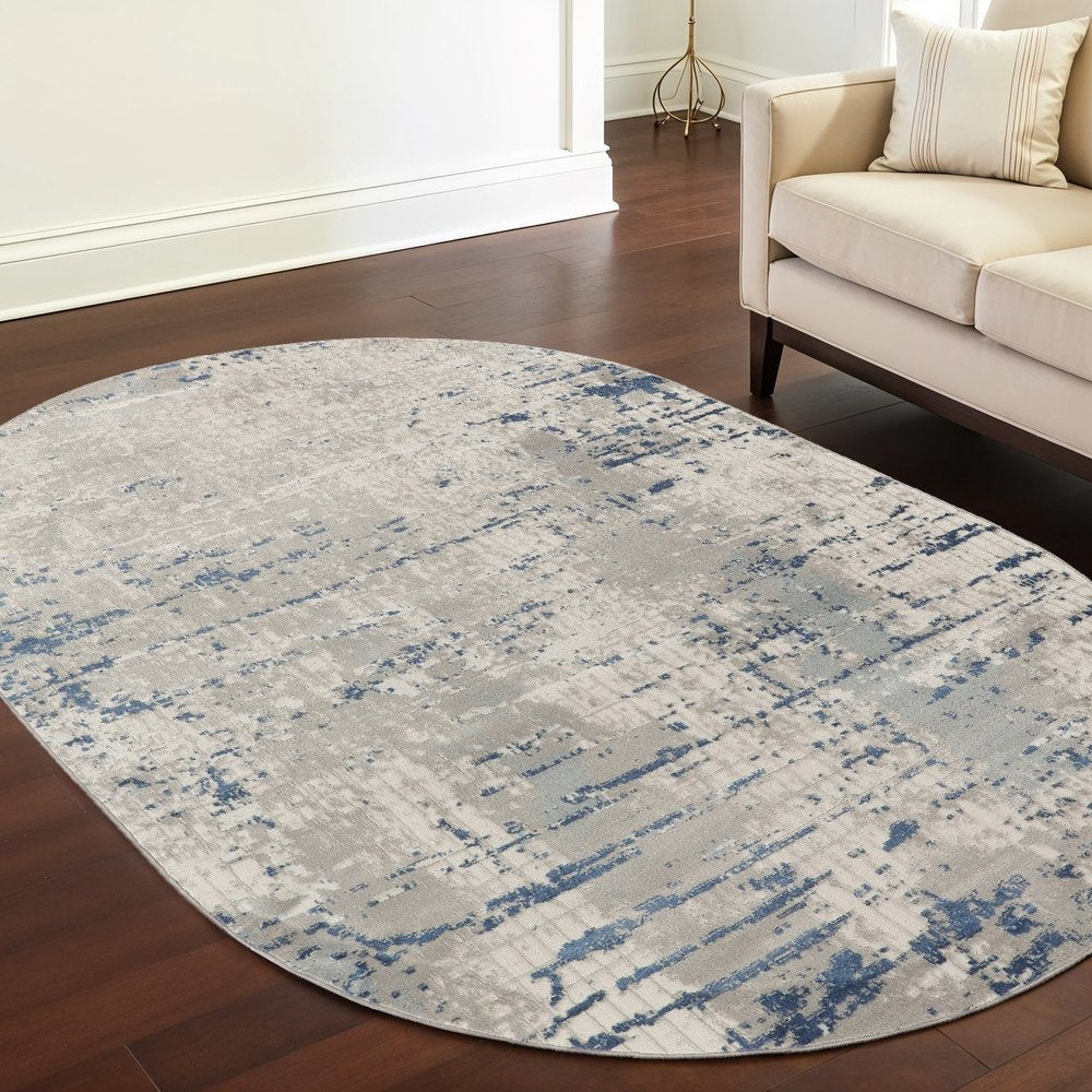 5' X 8' Gray and Ivory Abstract Power Loom Area Rug