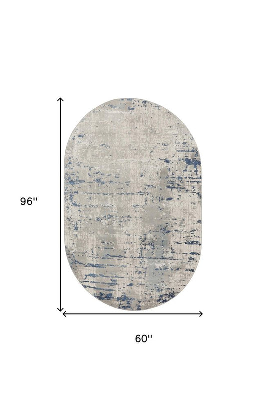 5' X 8' Gray and Ivory Abstract Power Loom Area Rug