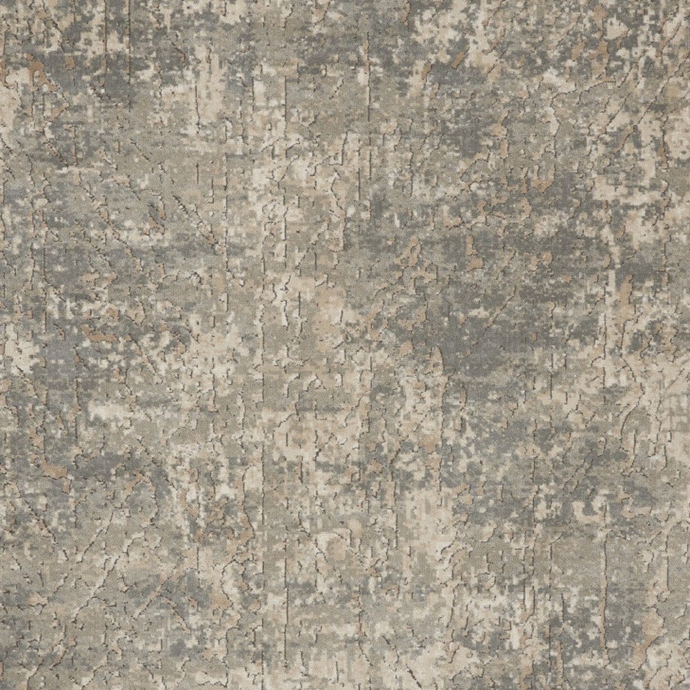 7' X 10' Beige and Gray Abstract Power Loom Area Rug