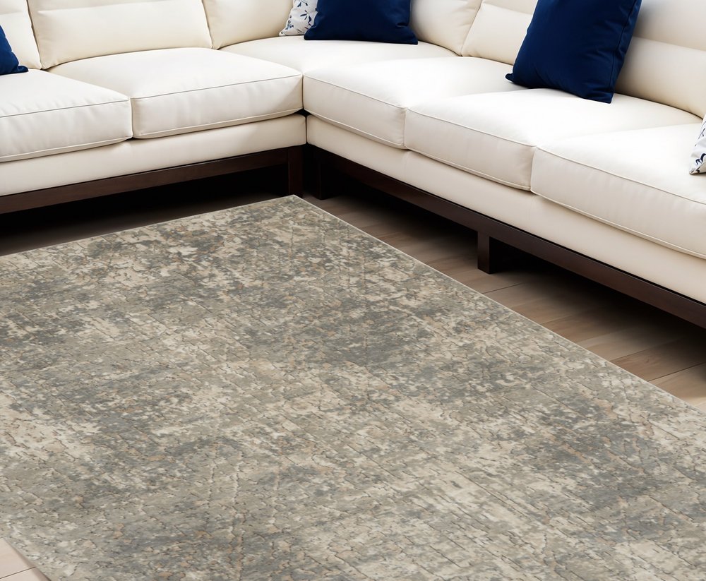 7' X 10' Beige and Gray Abstract Power Loom Area Rug