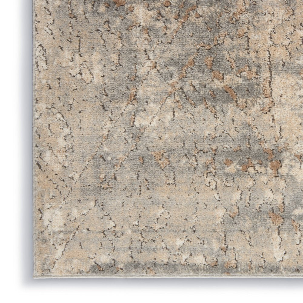 7' X 10' Beige and Gray Abstract Power Loom Area Rug
