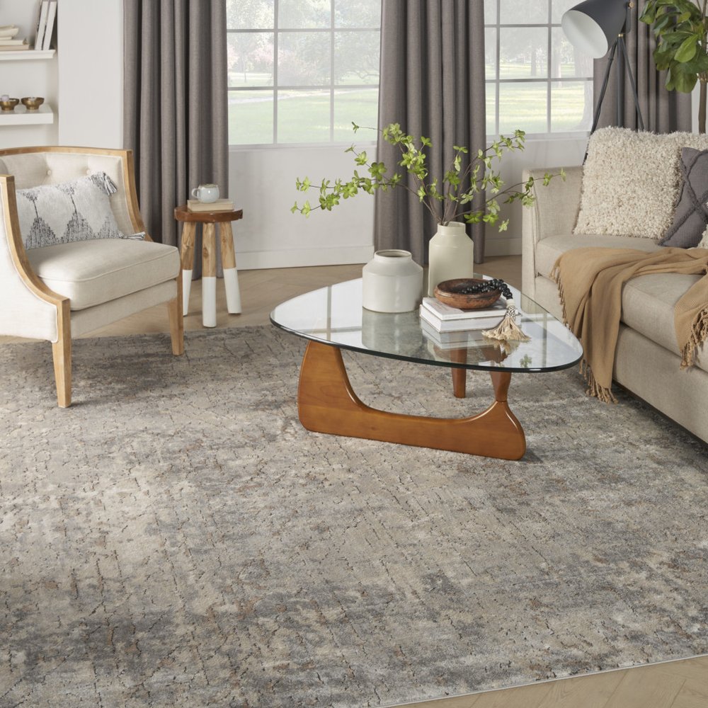 7' X 10' Beige and Gray Abstract Power Loom Area Rug