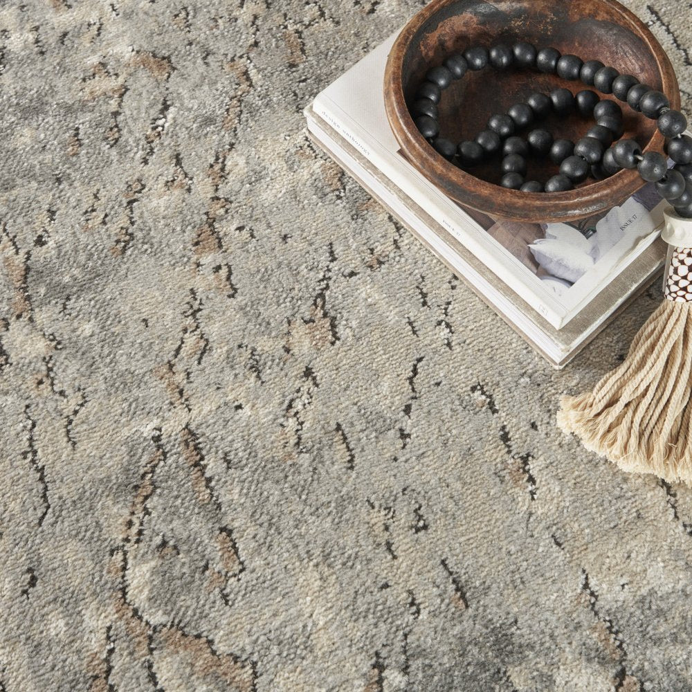 7' X 10' Beige and Gray Abstract Power Loom Area Rug
